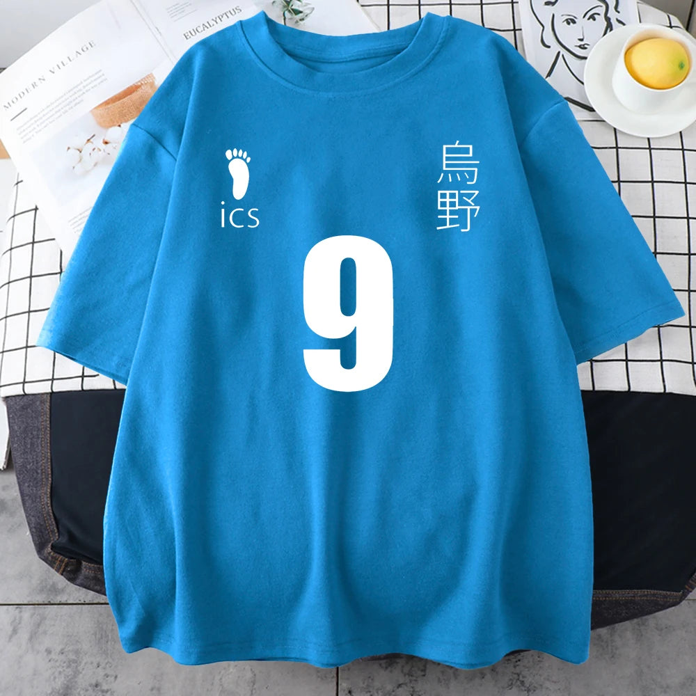 Blue t-shirt with white text and numbers on a checkered surface